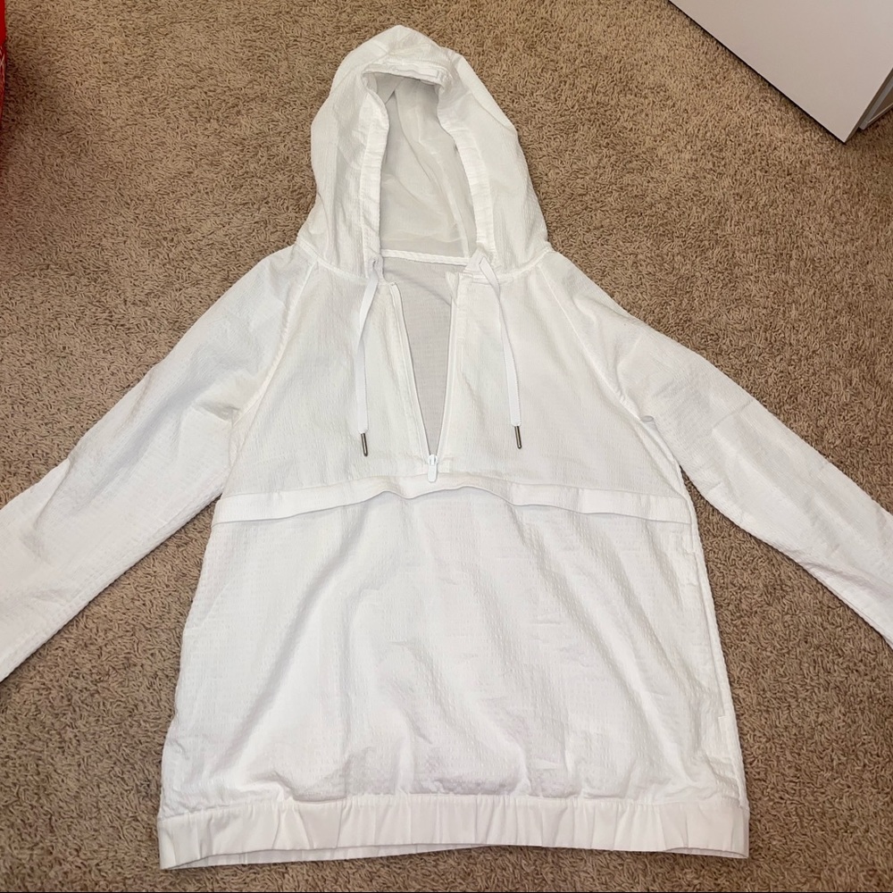 Lululemon *rare*
size 6 
White half zip rain or wind jacket with hood!